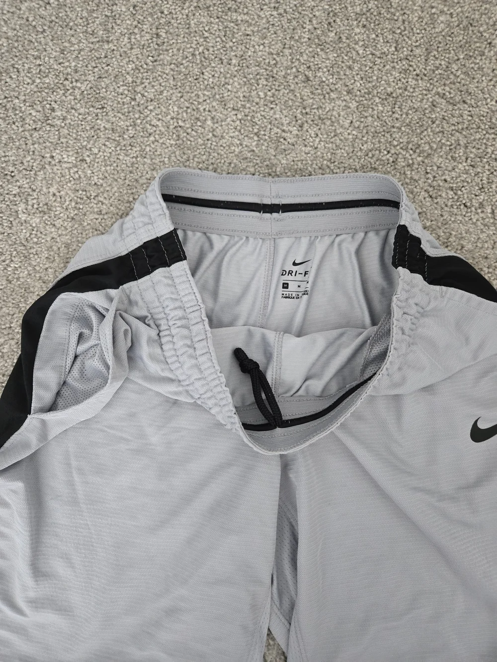 Nike Light Gray Athletic Shorts with Black Side Panels